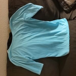 Small, teal with cream open back